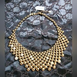 Park Lane gold costume bib necklace.